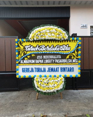 Papan Bunga Duka di Kumun Debai
